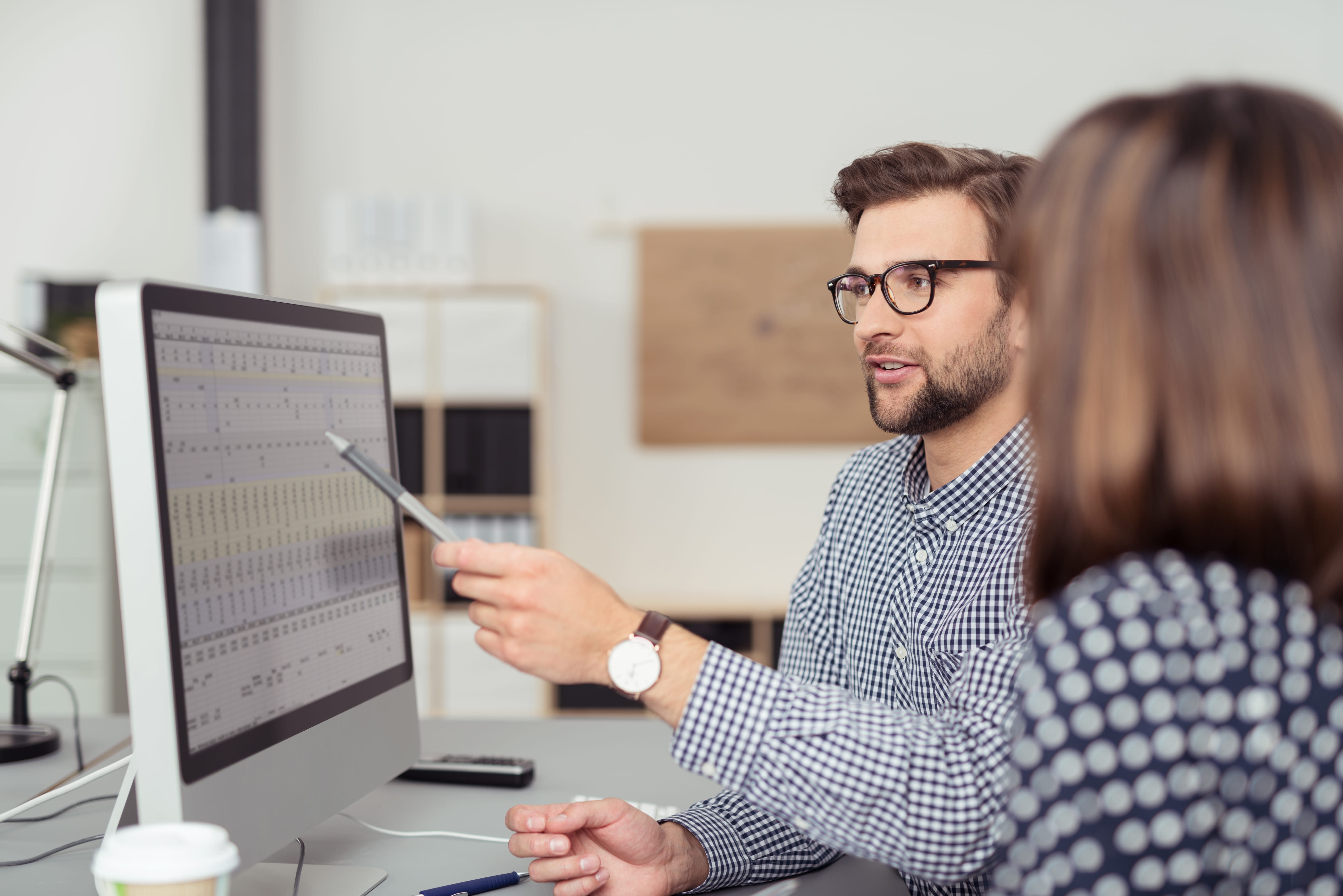 Man and woman at computer